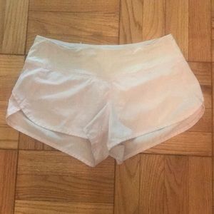 Light pink LuLu Lemon running shorts, size 4.